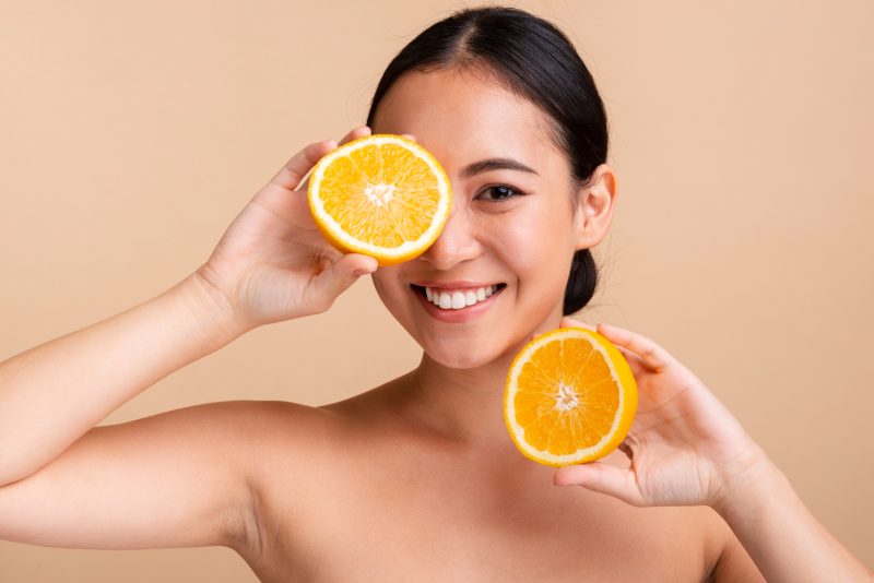 close up asian girl with orange