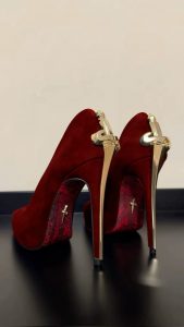 Cesare Paciotti suede high heel sandals showing red sole with iconic dagger motif